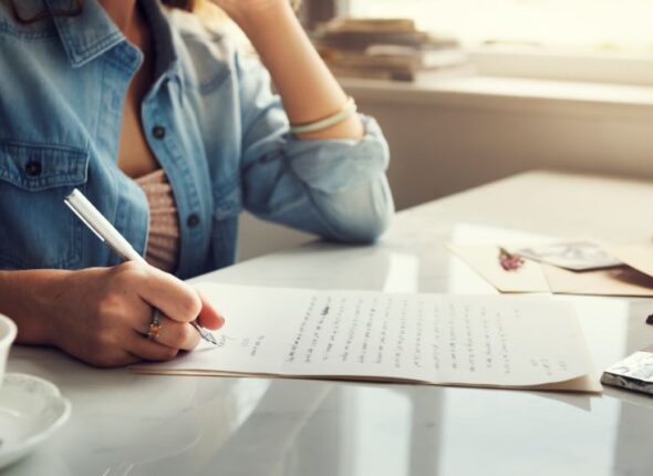 caucasian-woman-writing-letter