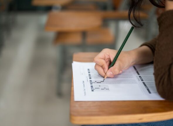 female-student-taking-tests-university