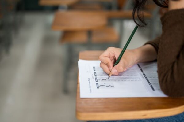 female-student-taking-tests-university