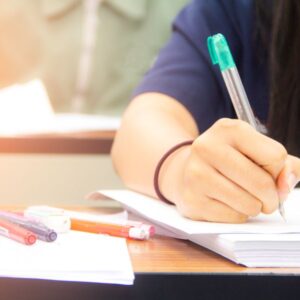 hands-university-student-study-quiz-test-exam-from-teacher-large-lecture-classroom-school